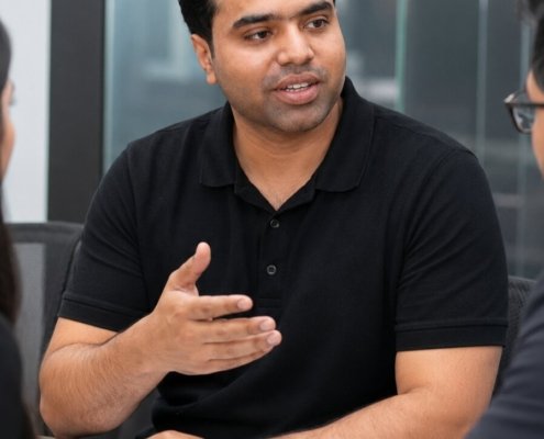 Syed Raheel Shahzad Professional Hall Conversation Syed Raheel Shahzad in a professional hall conversation connected with The Syed Group, public presence, and business identity.