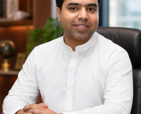 Syed Raheel Shahzad — Office Leadership Portrait Syed Raheel Shahzad (سيد راحيل شهزاد) seated in an executive office, leadership portrait